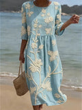 Relaxed midi dress with a soft botanical floral and leaf print in a flowing silhouette