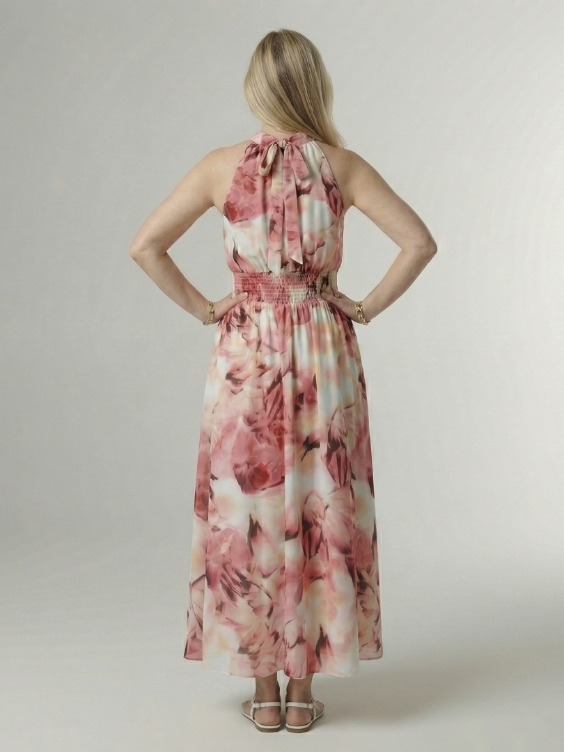 Yellow halter neck midi dress with a ruched waist detail in a clean, simple silhouette