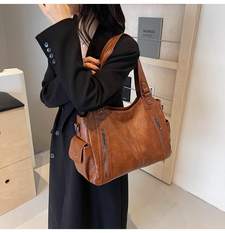 Classic structured tote bag in dark brown with comfortable shoulder straps