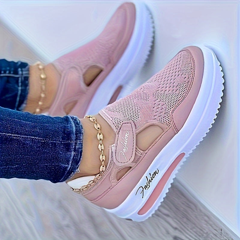 A woman slipping on breathable, cushioned slip-on trainers with trousers