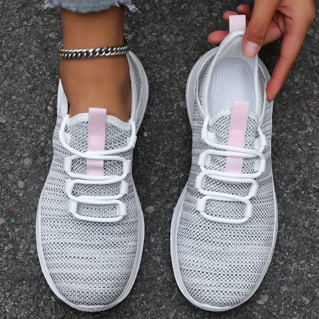 A woman walking comfortably in lightweight breathable trainers with trousers