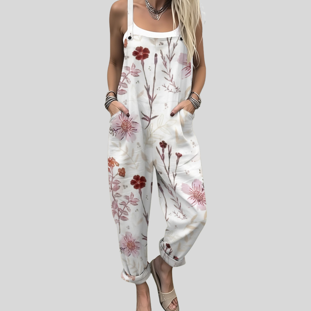 White wide-leg dungarees with fine red and bordeaux blossom branches, relaxed fit, from Mary Cork Ireland.
