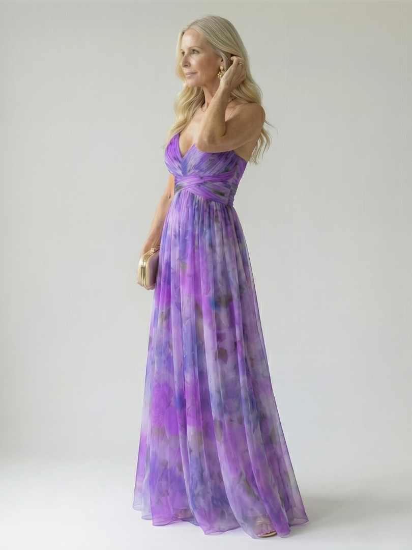 Multicolour sleeveless wrap maxi dress with thin straps, defined waist and flowing skirt
