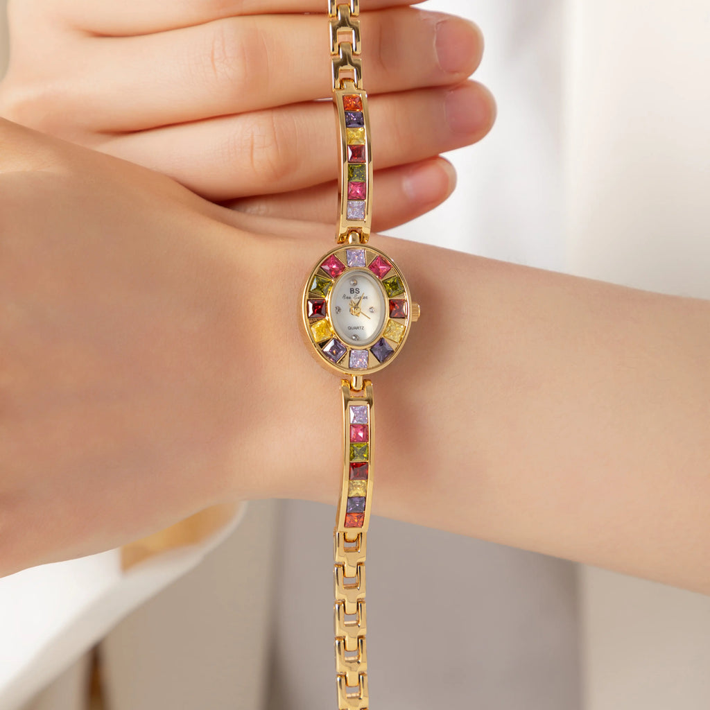 Women's colourful watch with golden detail trim in gold tones