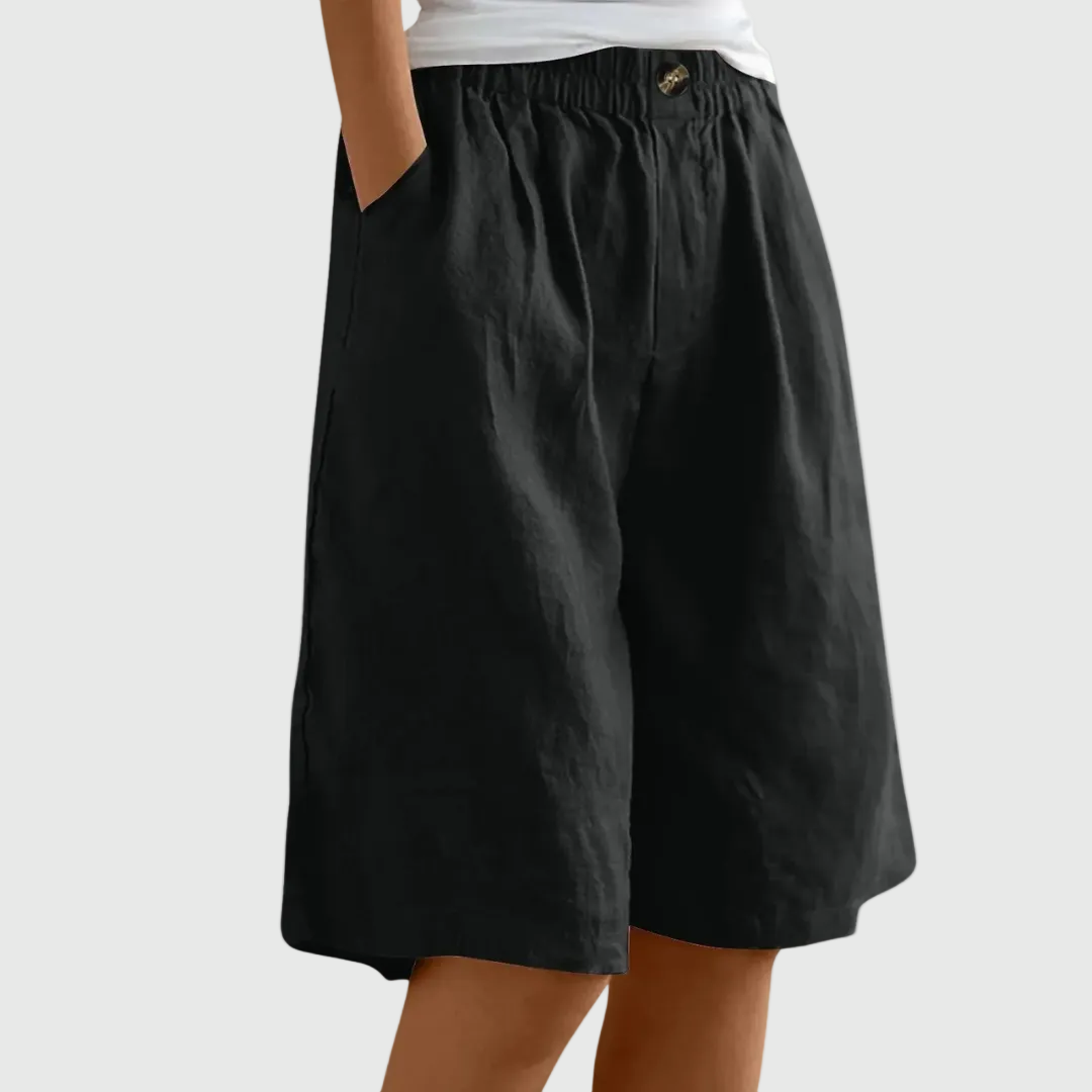 Women's casual leisure shorts in soft pink with an elasticated waist and relaxed fit