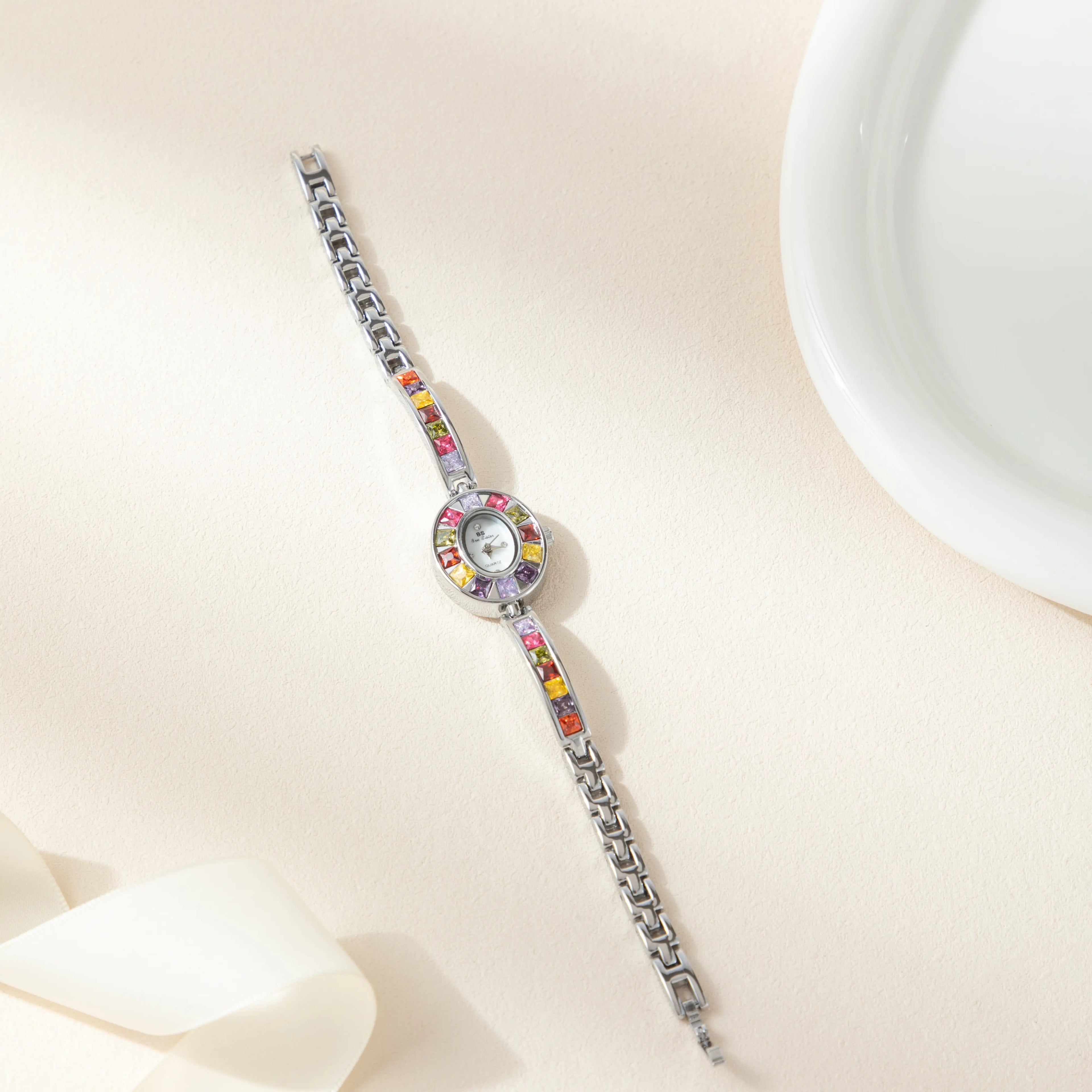 Women's colourful watch with golden detail trim in gold tones