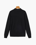 Men's black ribbed roll-neck jumper with a clean structured silhouette
