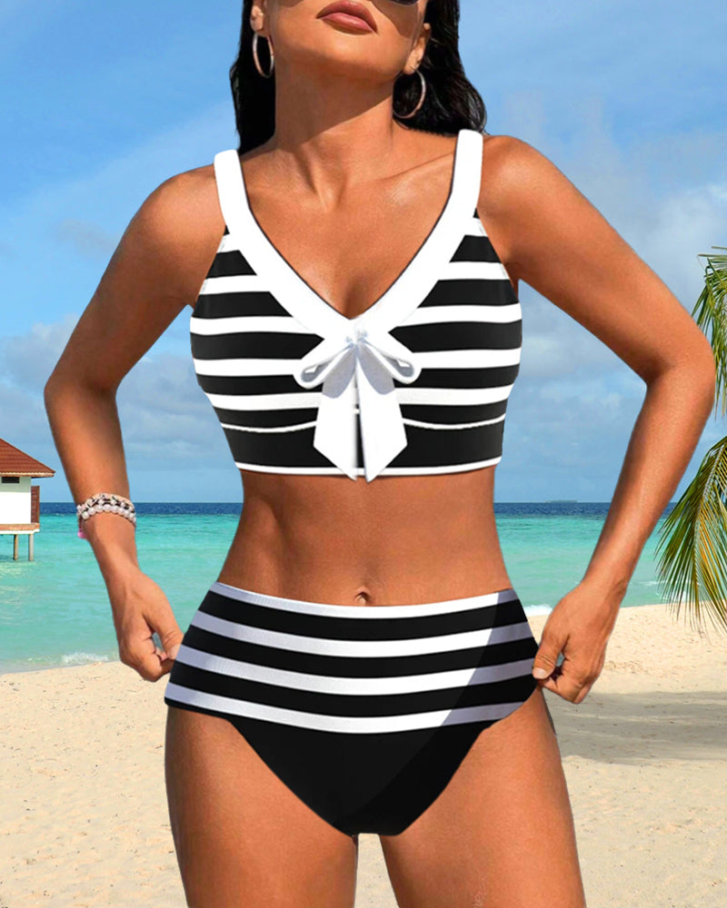 Black and white striped high-waist bikini with a knotted front detail on the top