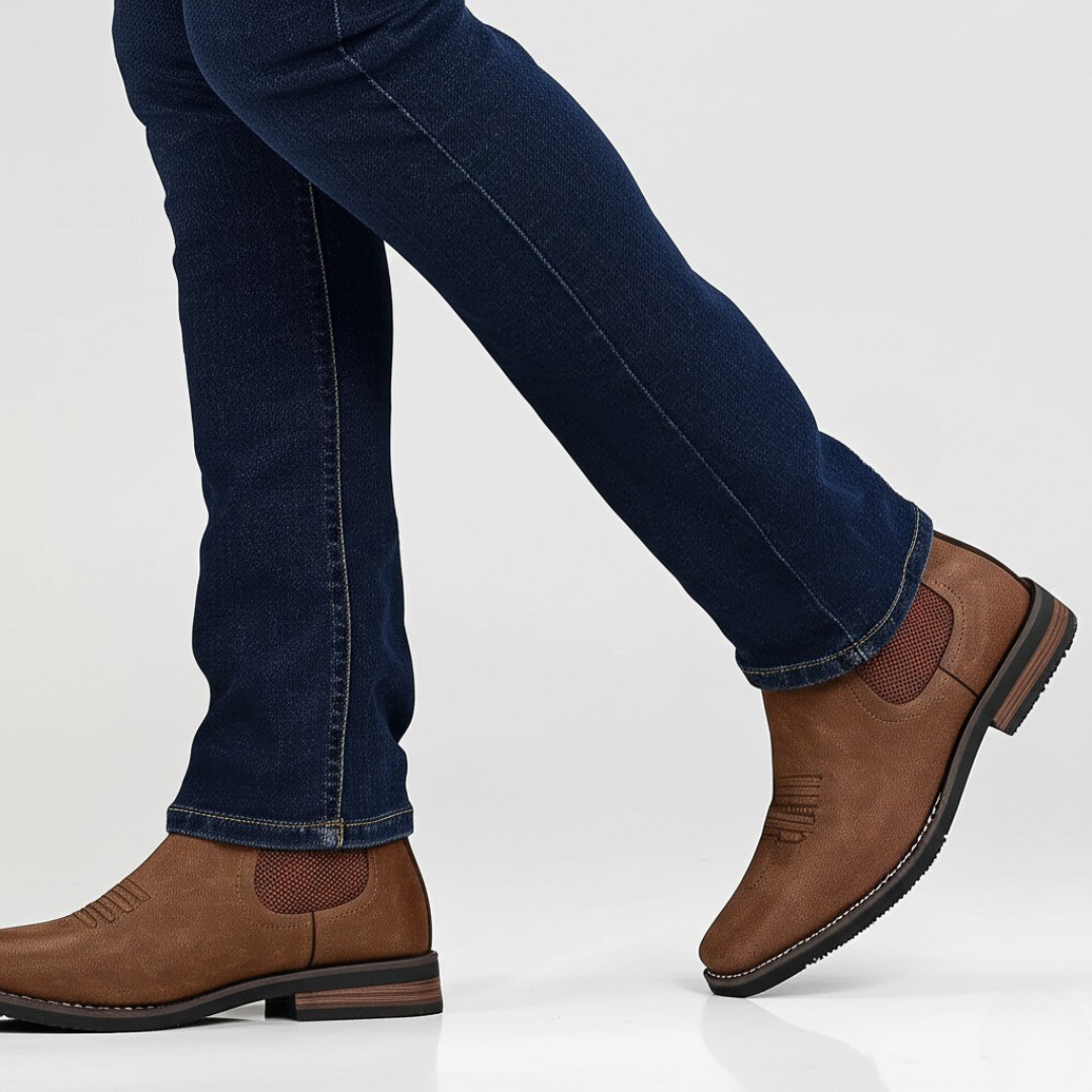 Men's brown smart Chelsea boots with elastic side panels and a sturdy structured sole