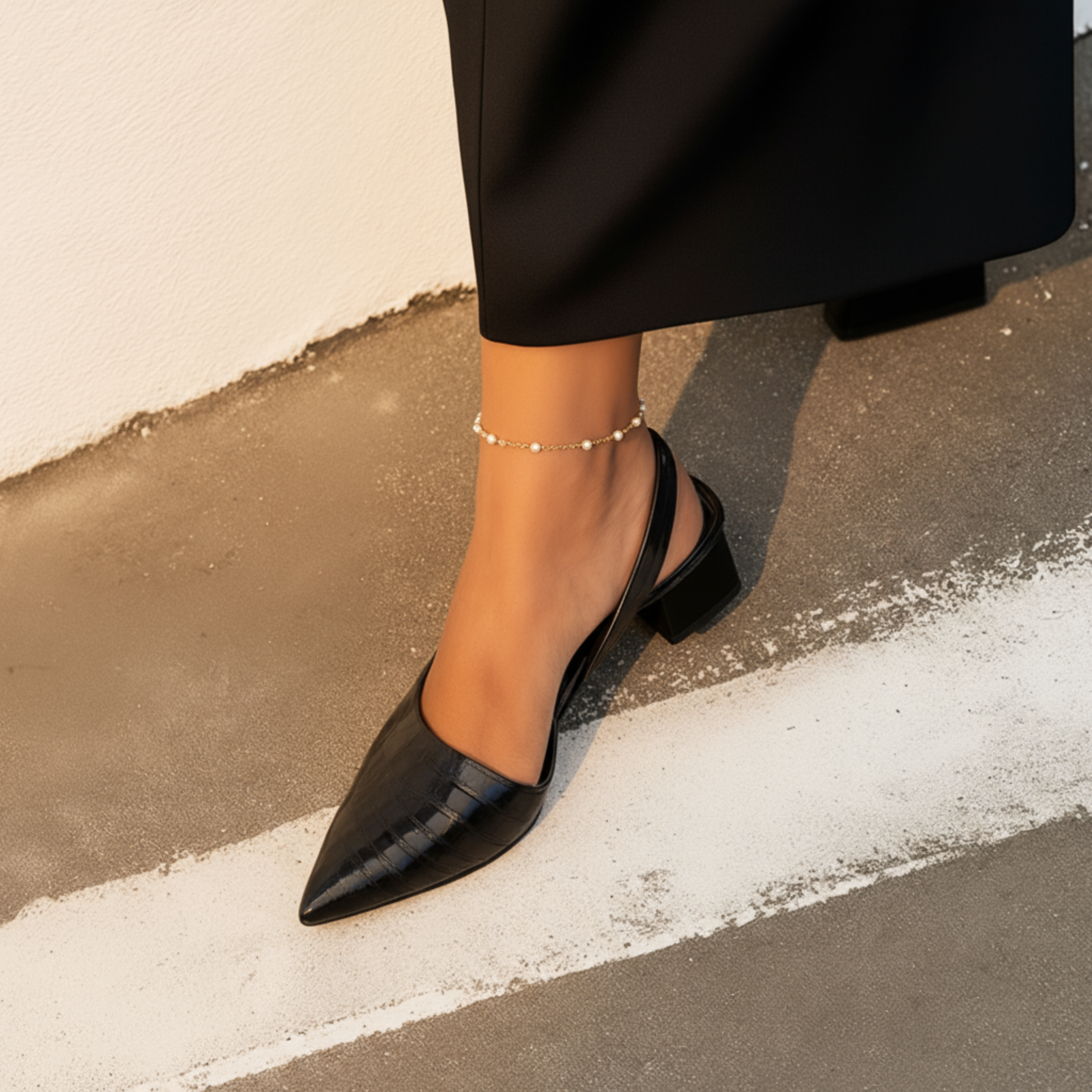 Black orthopaedic comfort heels with a wide toe box and low supportive heel