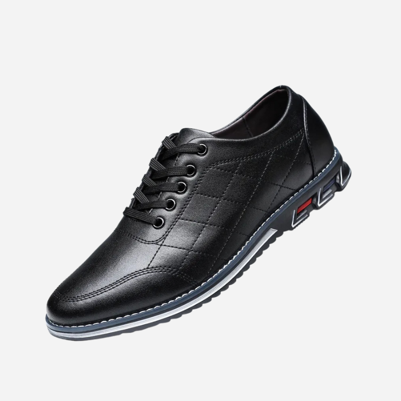 Men's black comfort dress shoes with a clean profile and polished upper on a neutral background