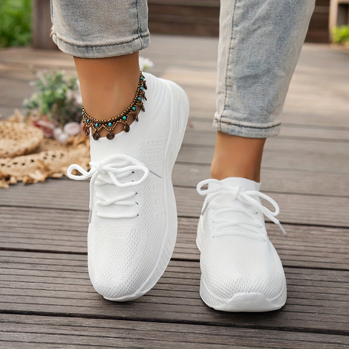 A woman wearing ultra-light comfort trainers on a long walk