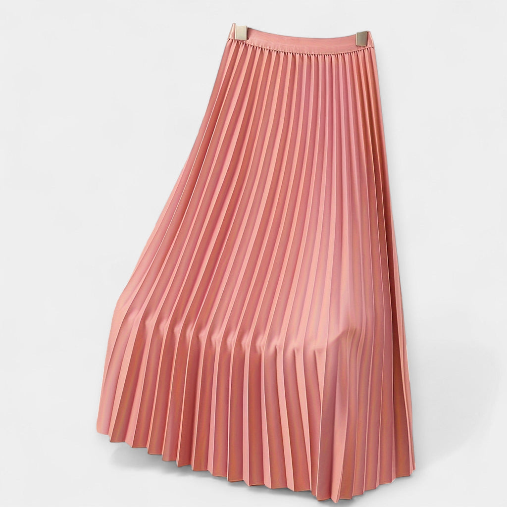 Wide pleated high-waist midi skirt in soft blush pink with a flowing silhouette