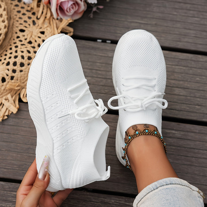 A woman wearing ultra-light comfort trainers on a long walk