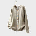 Elegant everyday cardigan in beige, dark brown and green tones with a clean, fitted silhouette