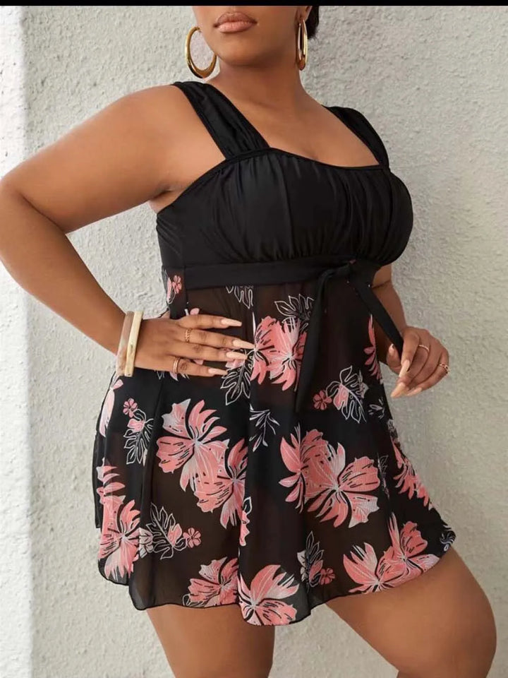 Printed swim dress with gathered skirt in black with polka dots