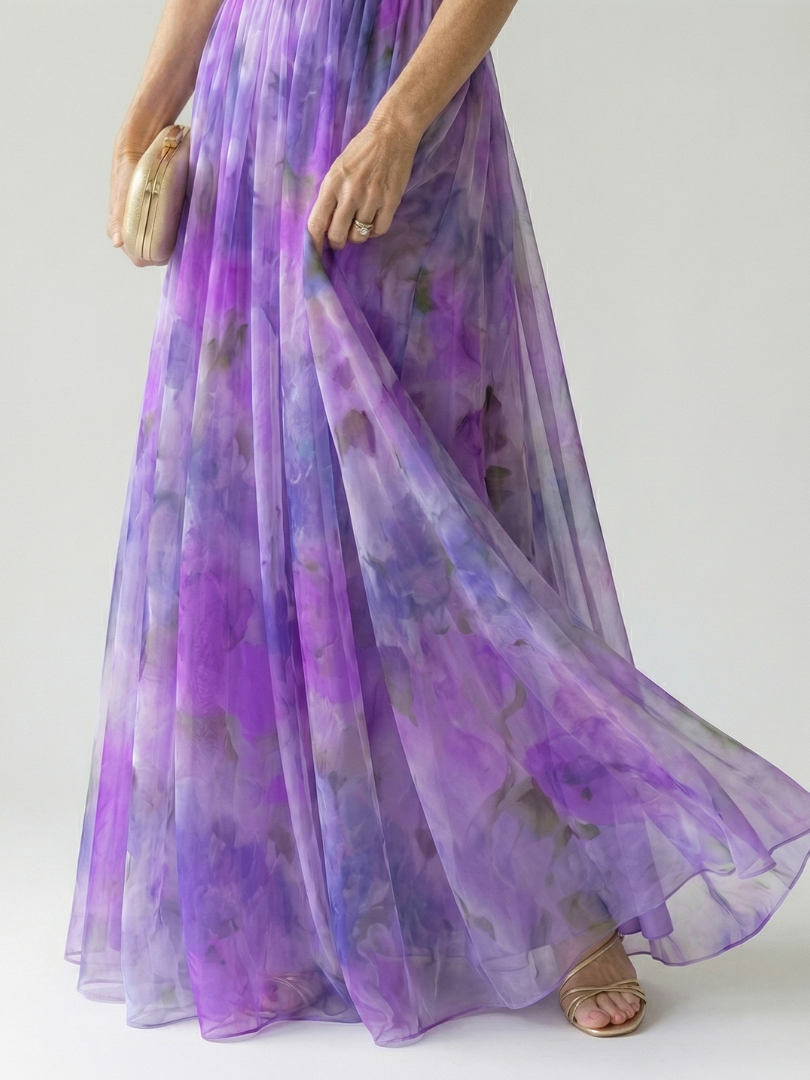 Multicolour sleeveless wrap maxi dress with thin straps, defined waist and flowing skirt