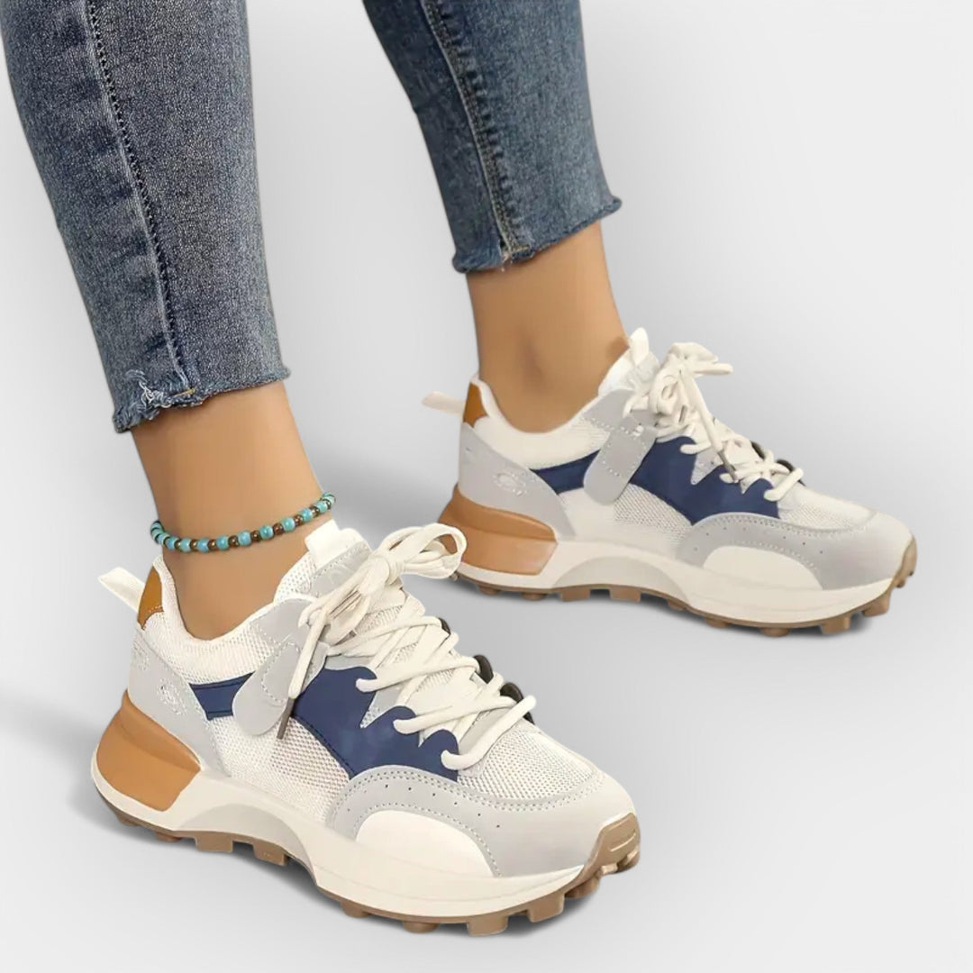Women's ergonomic daily trainers with cushioned sole in a modern clean design