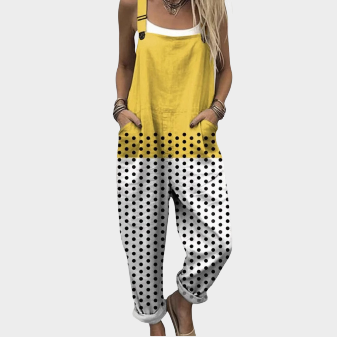 Woman wearing dungarees in a fresh yellow-to-white gradient scattered with playful spots