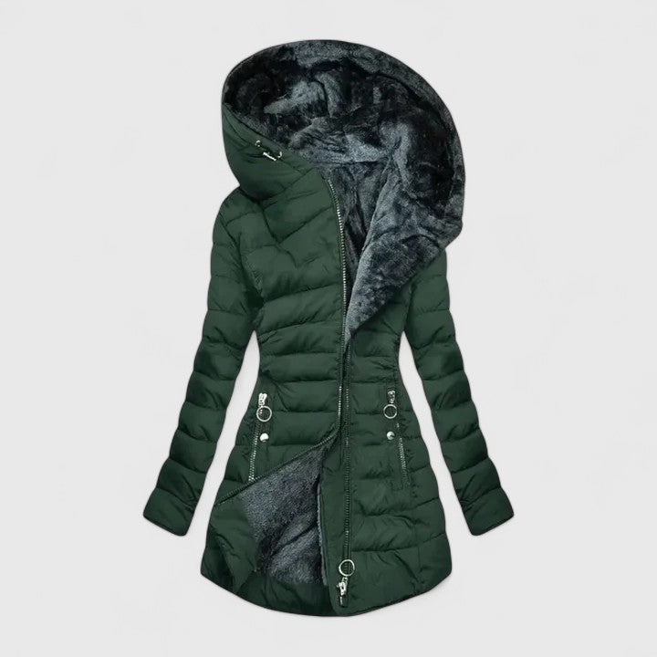 A sage green quilted winter coat with a deep, soft-lined hood and an angled zip front.