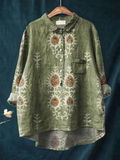 Women's printed top in green and blue tones with a light, relaxed and polished silhouette