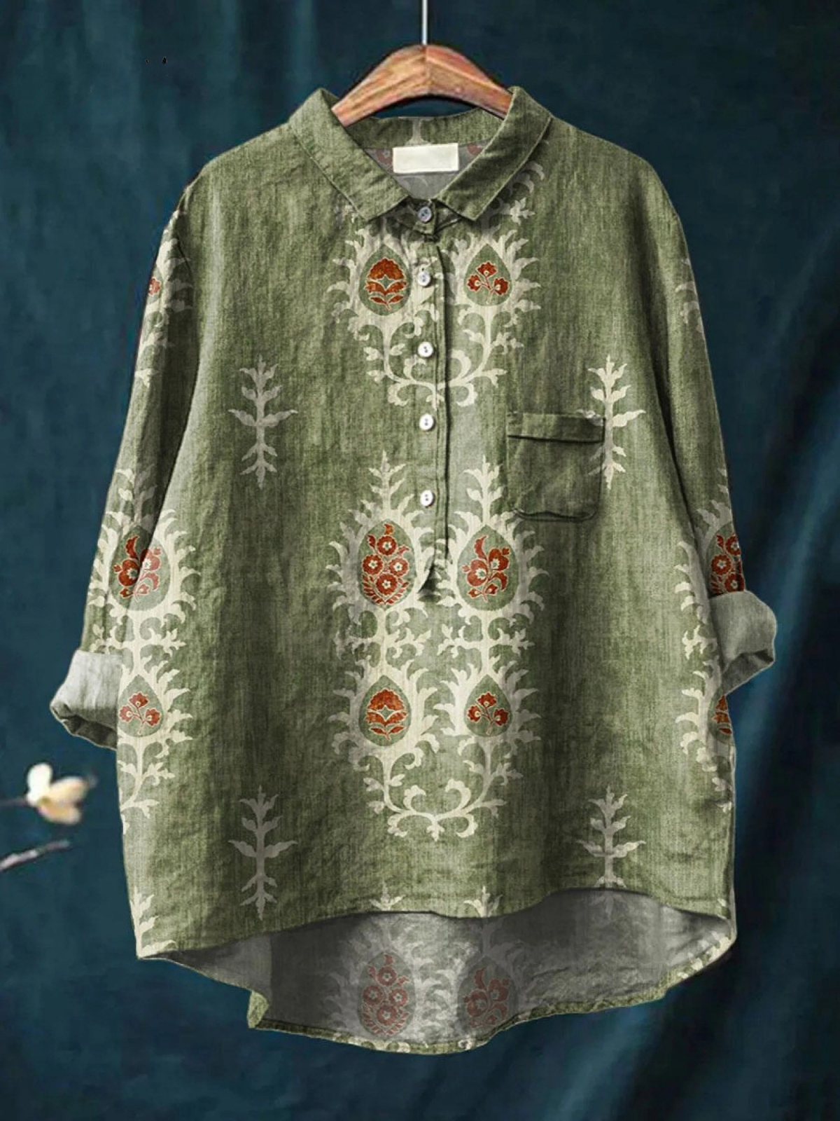 Women's printed top in green and blue tones with a light, relaxed and polished silhouette