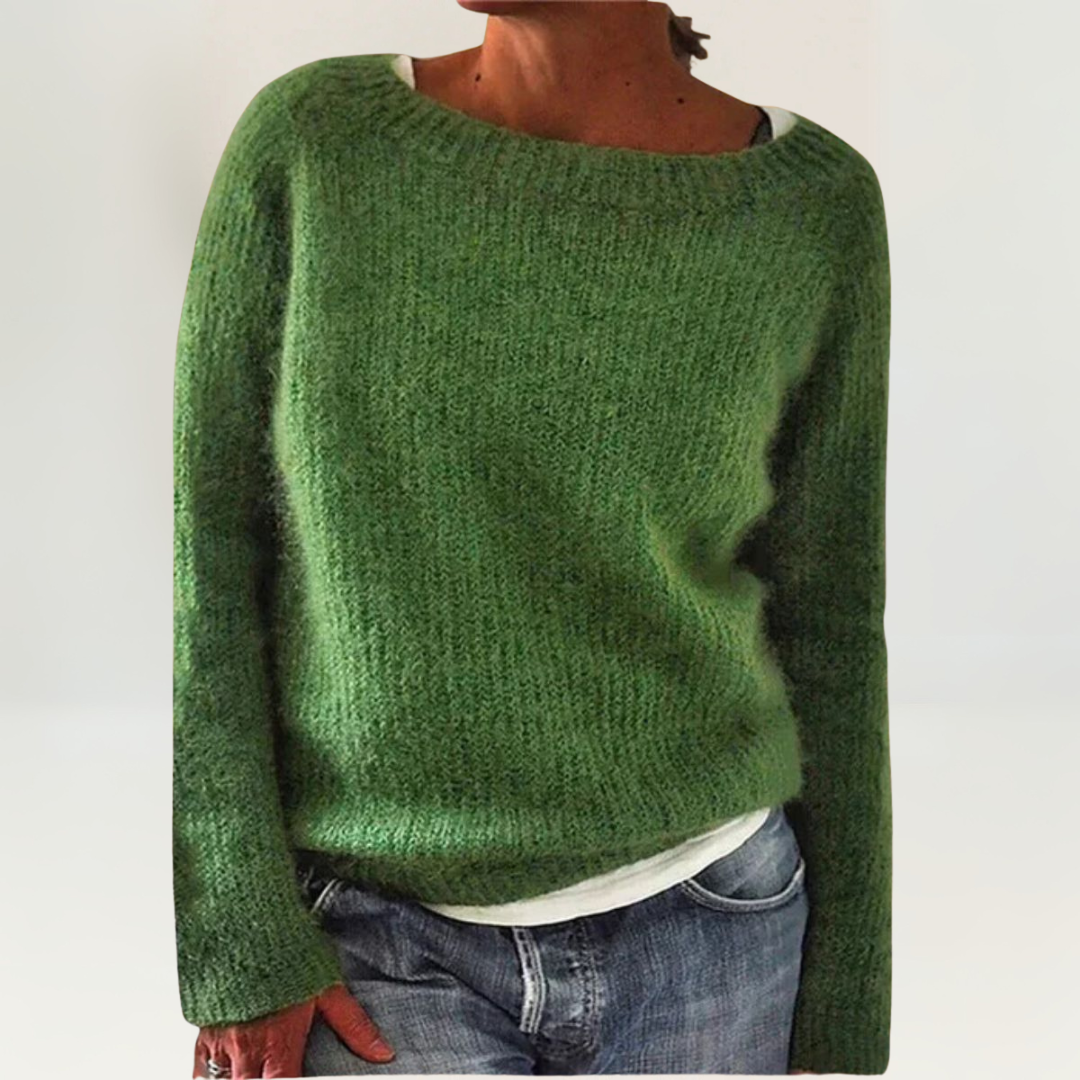 A woman wearing a soft, relaxed everyday jumper, comfortable and elegant with jeans.
