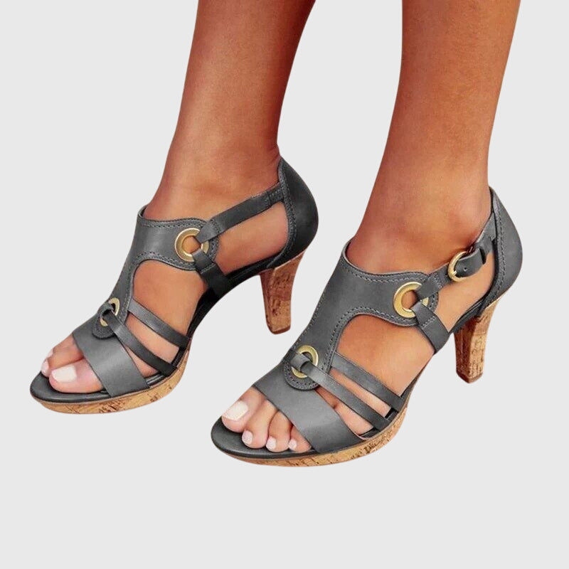 Elegant orthopaedic heels in brown and black with a stable, structured shape