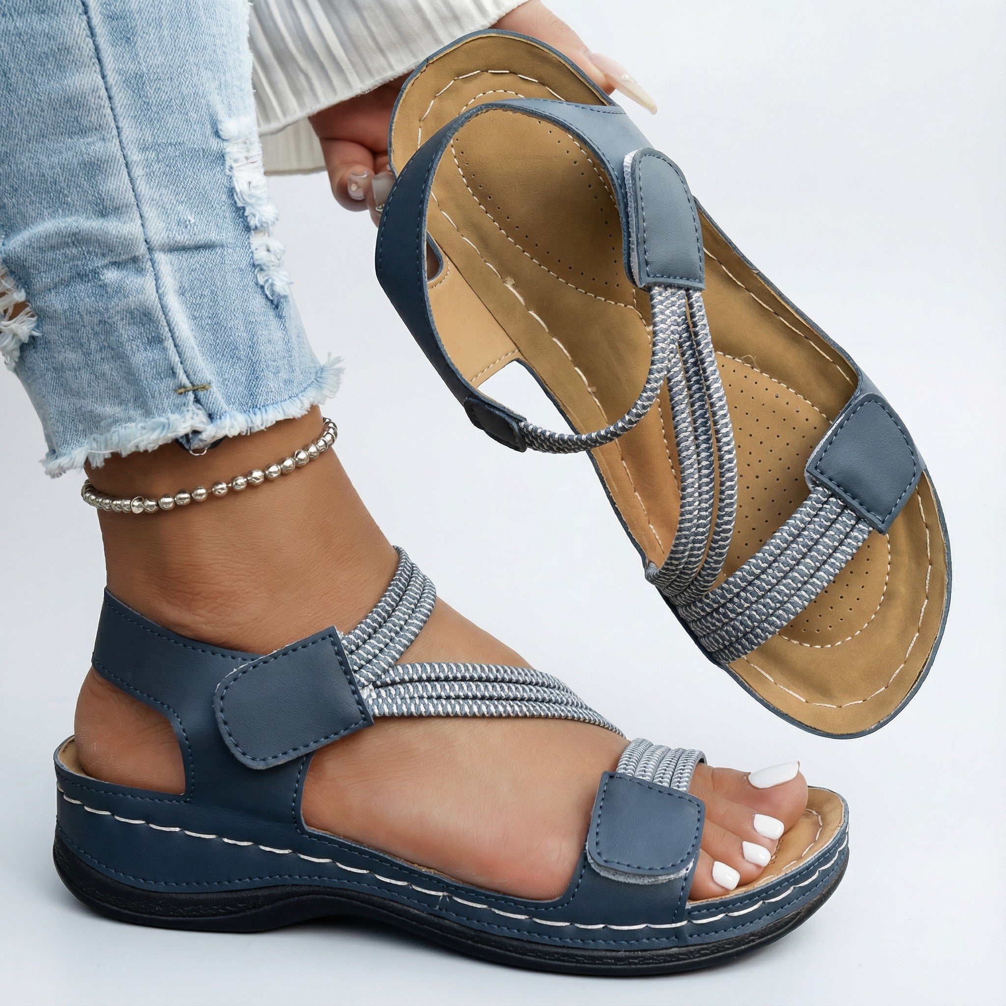 Women's easy strap sandals with a cushioned sole in blue, black, white, rose and beige