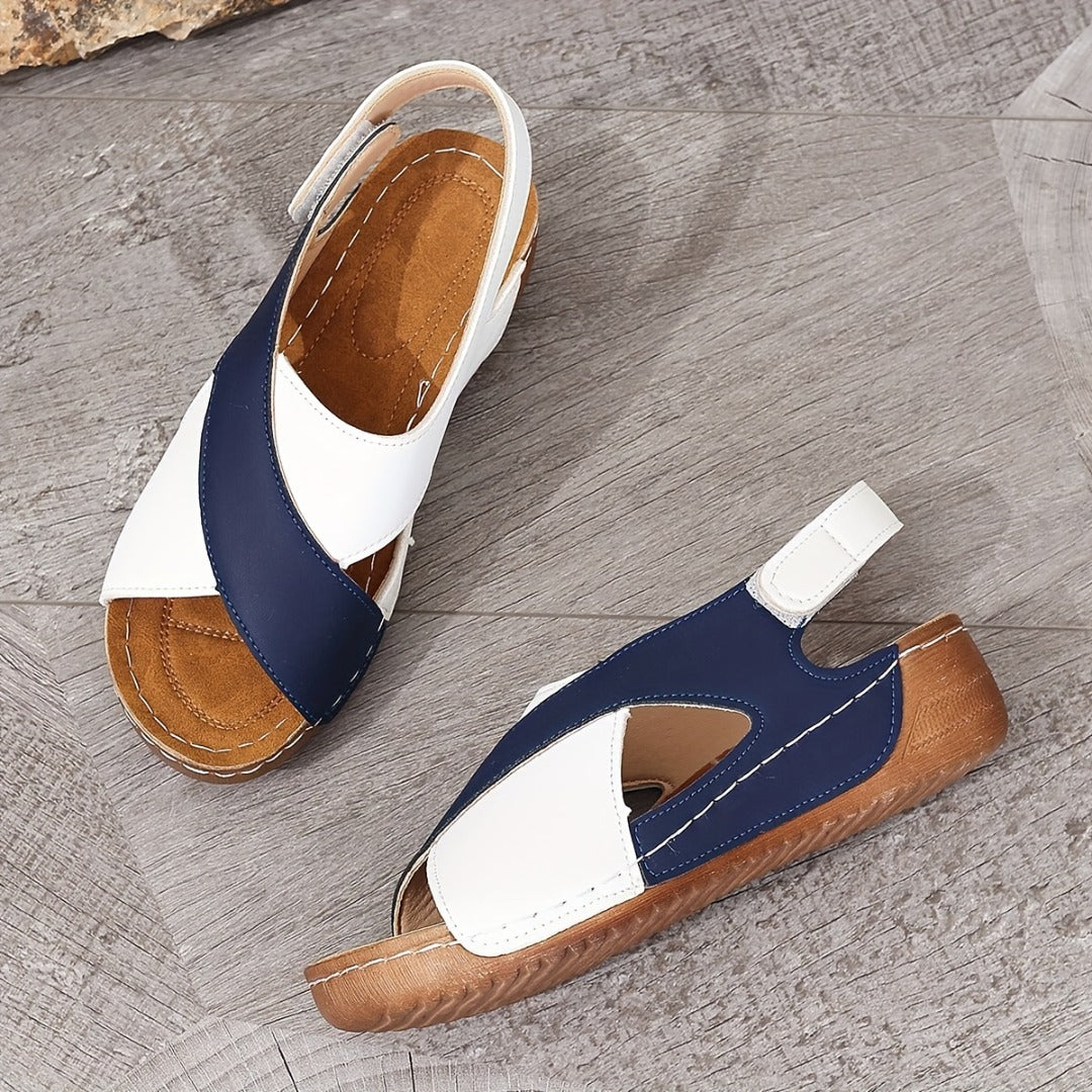 Women's wide-strap daily sandals in navy and white with a low supportive wedge
