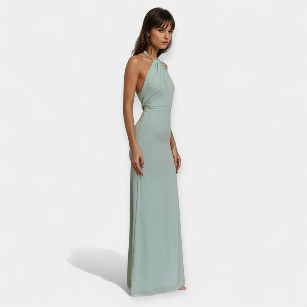 Flowing draped halter-neck maxi dress with an open back in soft light blue
