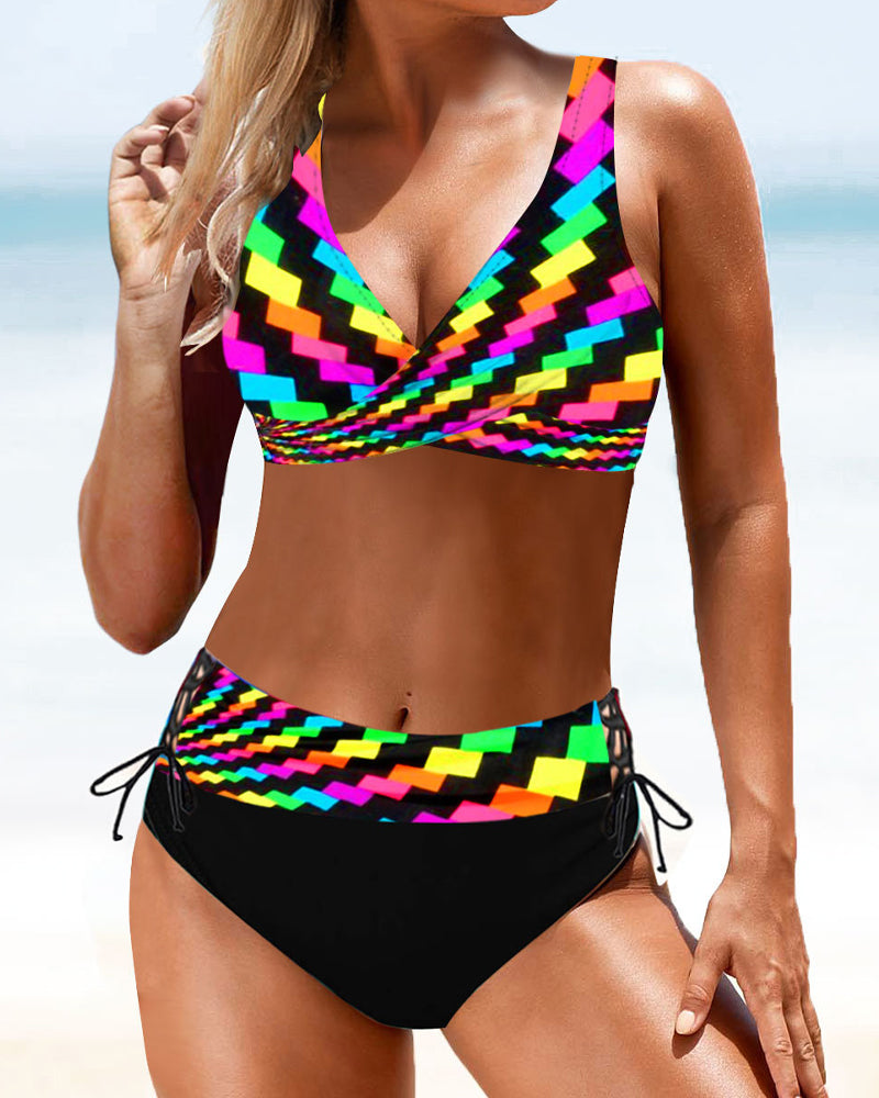 Fuchsia and multicolour crossover bikini with a V-neckline top and colourful bottoms