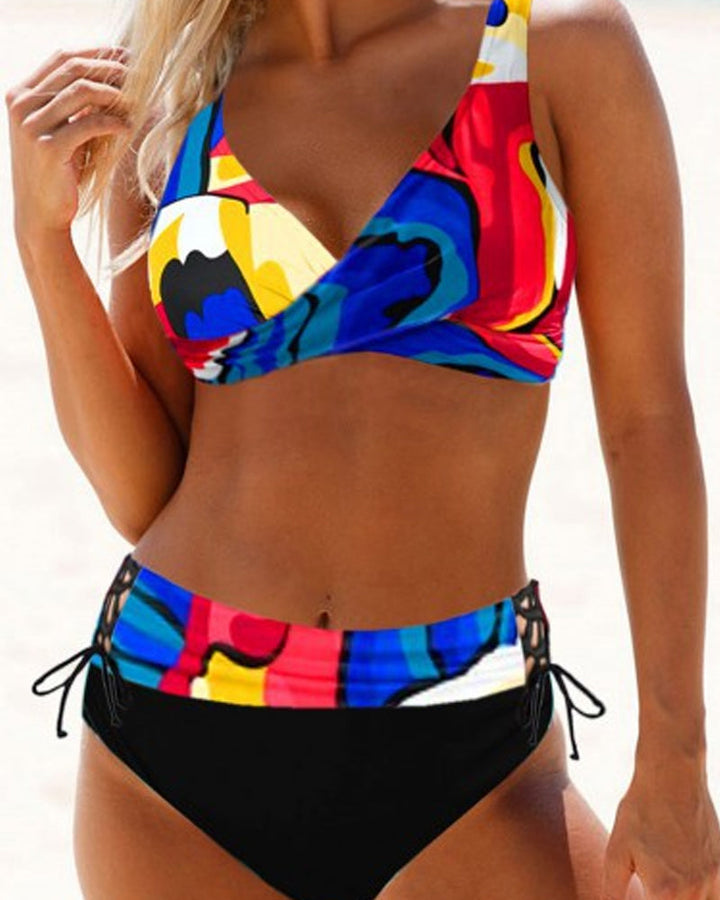 Fuchsia and multicolour crossover bikini with a V-neckline top and colourful bottoms