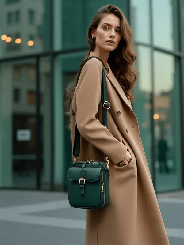 Small structured handbag with multiple pockets, available in light blue, green, orange, black, burgundy, white, pink and navy
