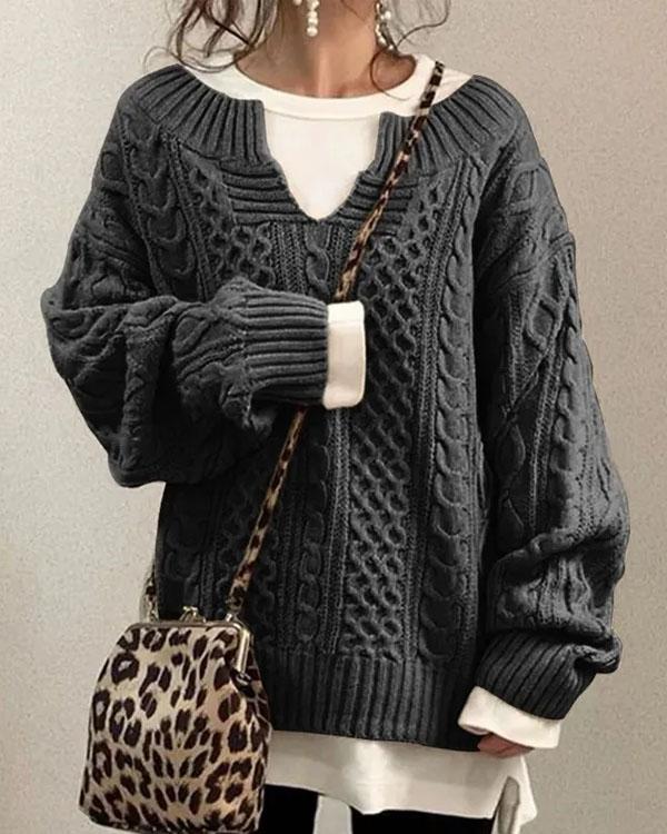 Beige cable knit v-neck jumper with classic textured pattern and relaxed fit