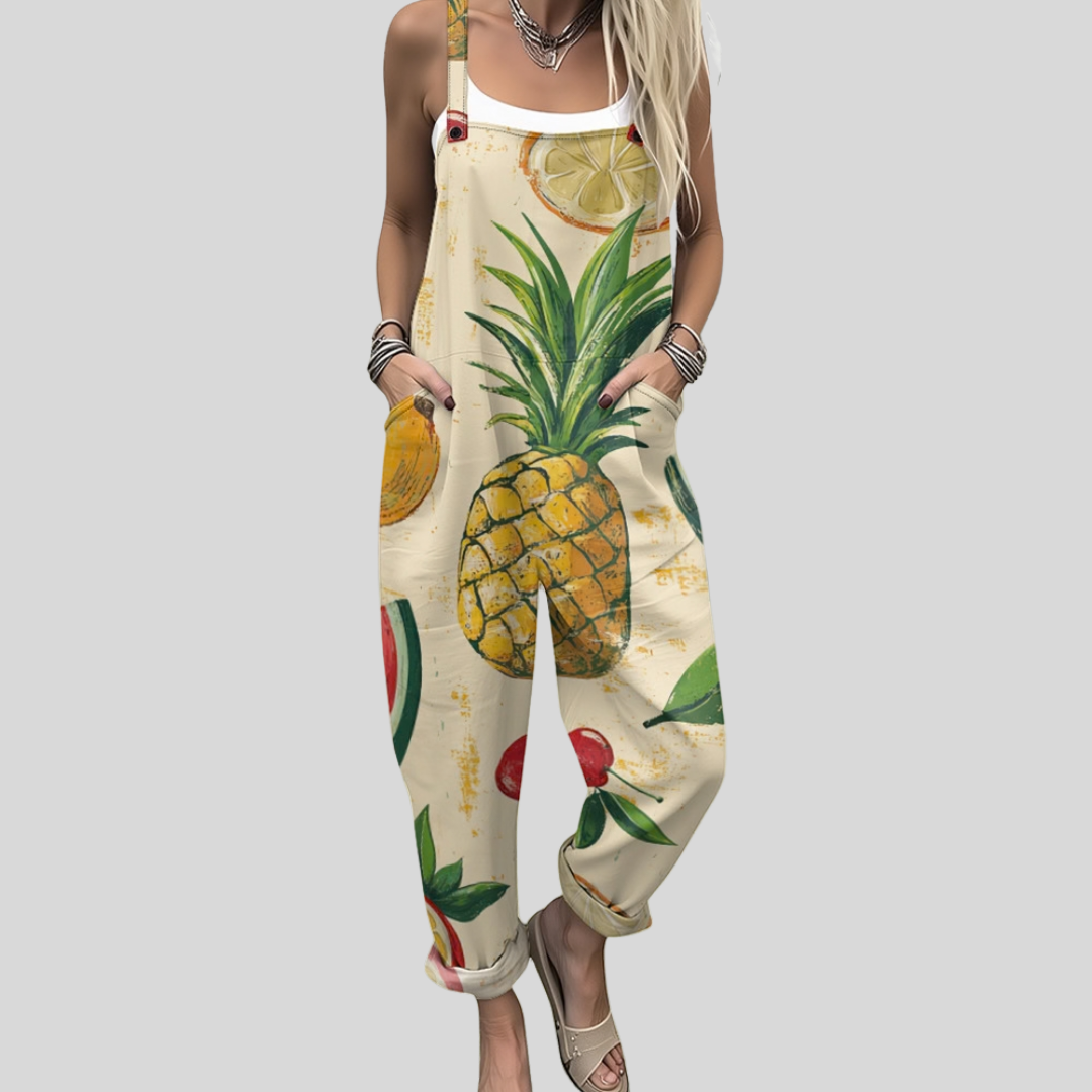 Honora™ wide-leg dungarees in warm cream with a cheerful tropical print of large pineapples, citrus slices, green leaves and round summer fruits.