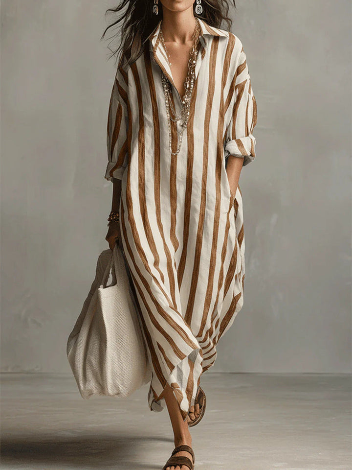 Women's striped maxi dress in pink and white with a classic shirt collar and flowing silhouette
