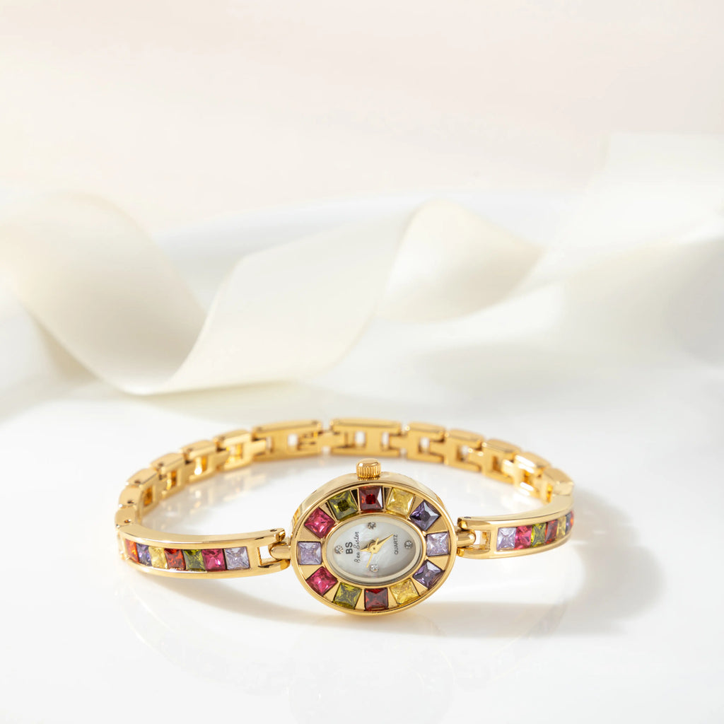 Women's colourful watch with golden detail trim in gold tones