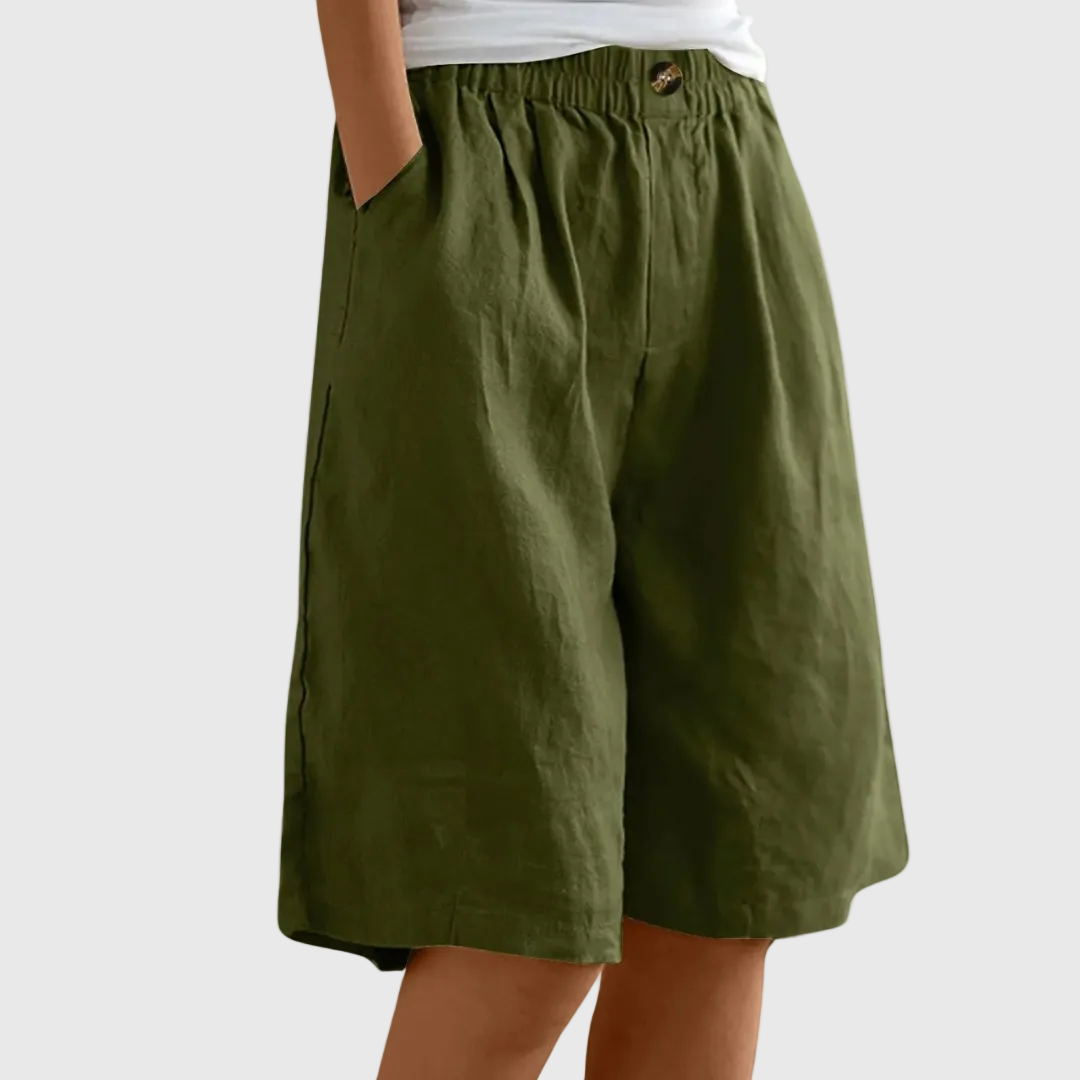 Women's casual leisure shorts in soft pink with an elasticated waist and relaxed fit