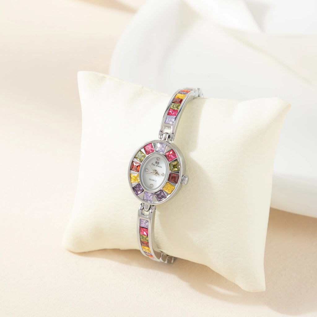 Women's colourful watch with golden detail trim in gold tones