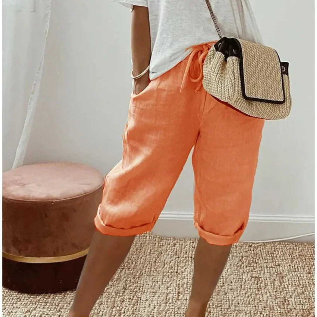 A pair of relaxed-fit summer shorts in beige with an elasticated drawstring waist