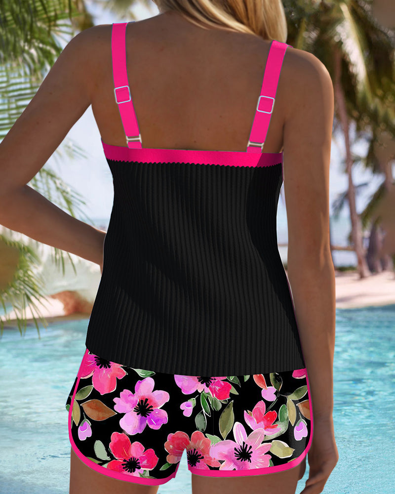 Tankini set with orange tropical-print shorts and matching top