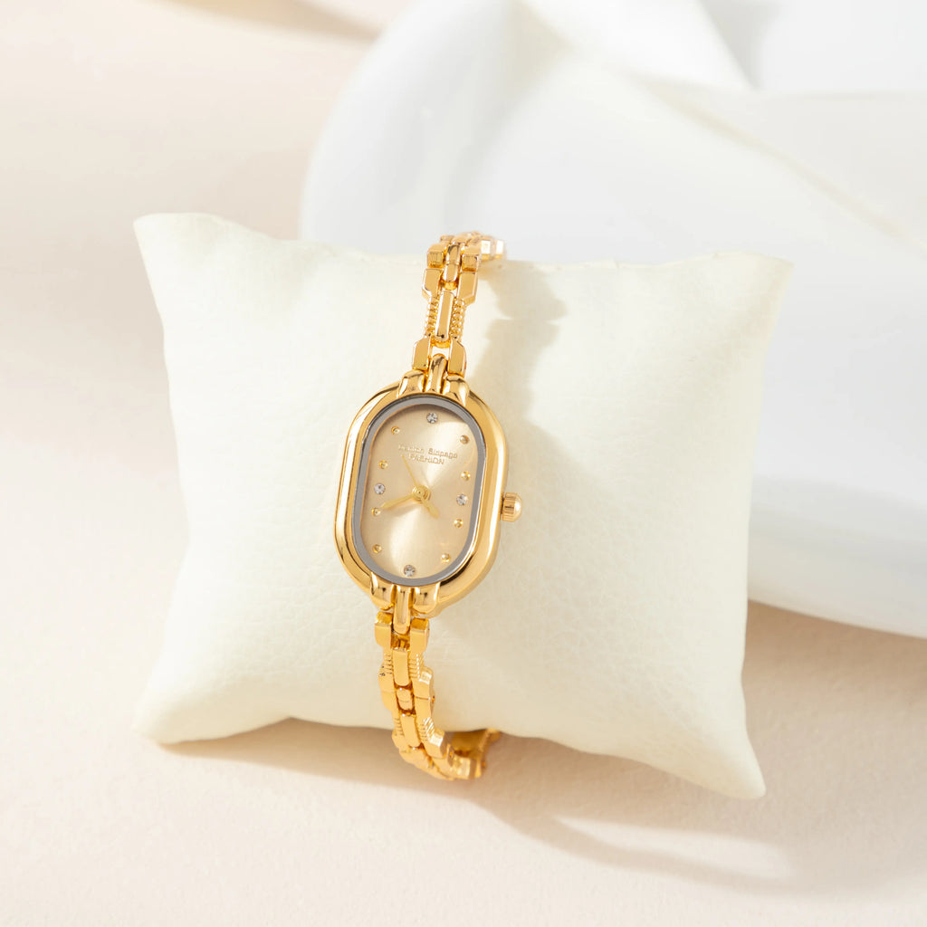 Women's slim minimalist watch with a clean dial and fine strap in a classic finish
