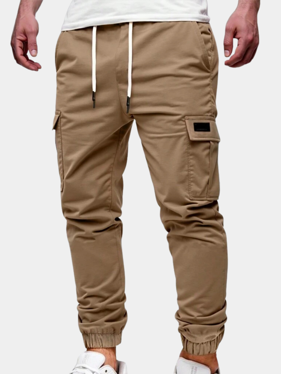 Men's modern urban cargo trousers in beige with cargo pockets and elasticated ankle cuffs