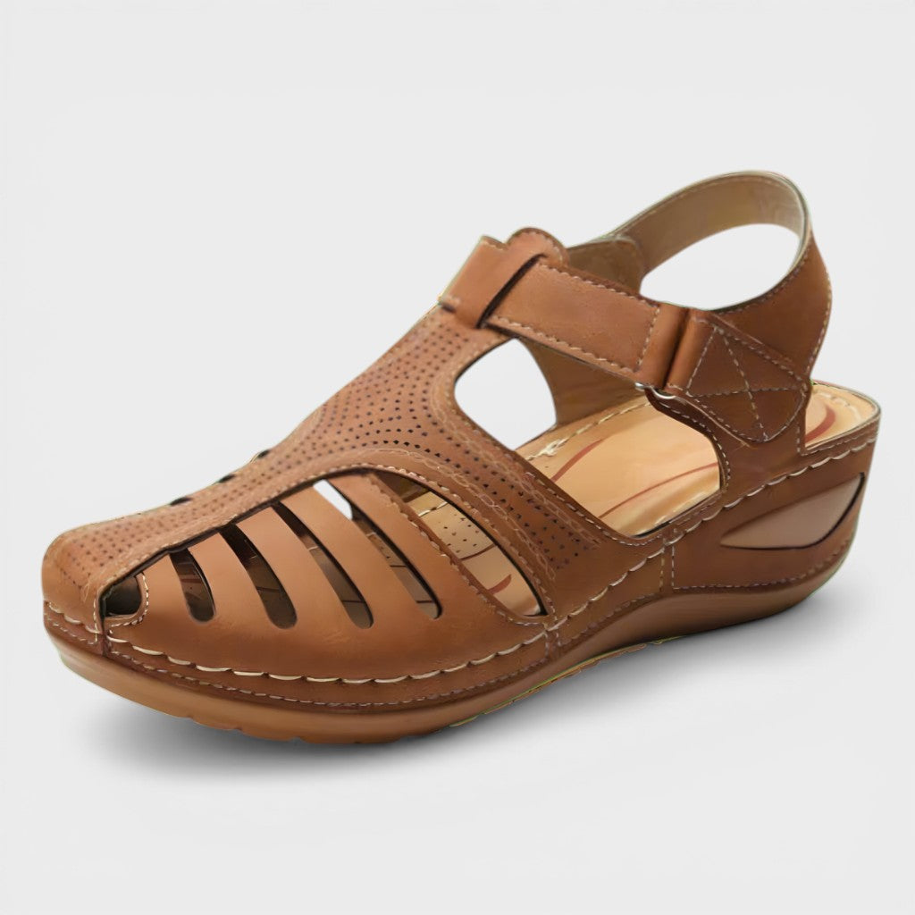Orthopaedic corrective sandals in navy and burgundy with a supportive, adaptive design