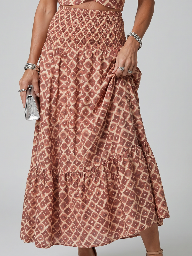 Geometric multicolour crossover halter midi dress with a fluid flowing skirt