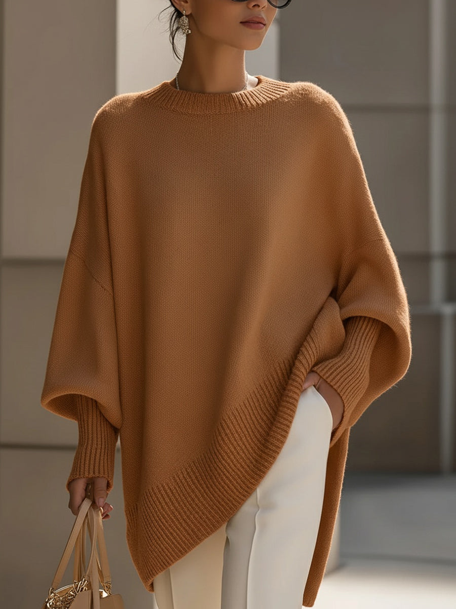 A woman wearing a soft crew neck jumper with jeans for a warm, easy everyday look.
