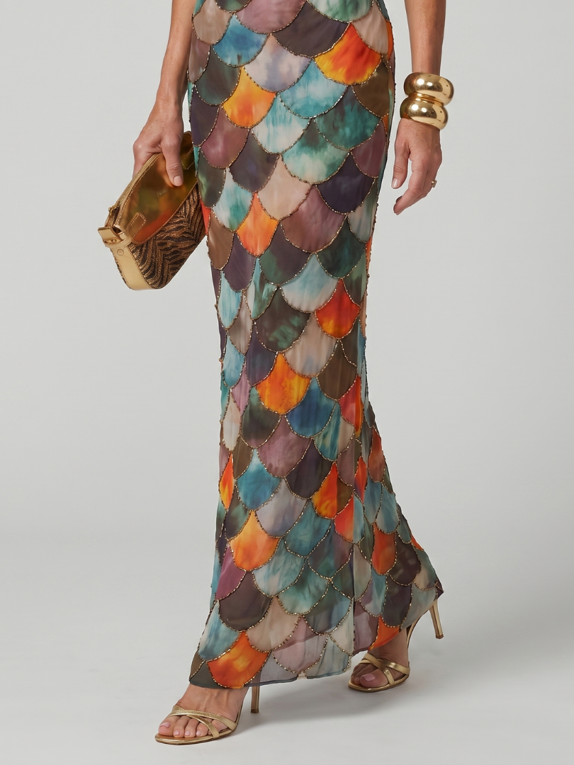 Geometric multicolour scale print halter neck maxi dress with a sleek fitted silhouette