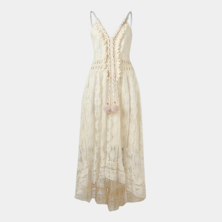 Woman wearing the Alice™ elegant boho midi dress with intricate detailing and a V-neckline at a summer garden party.