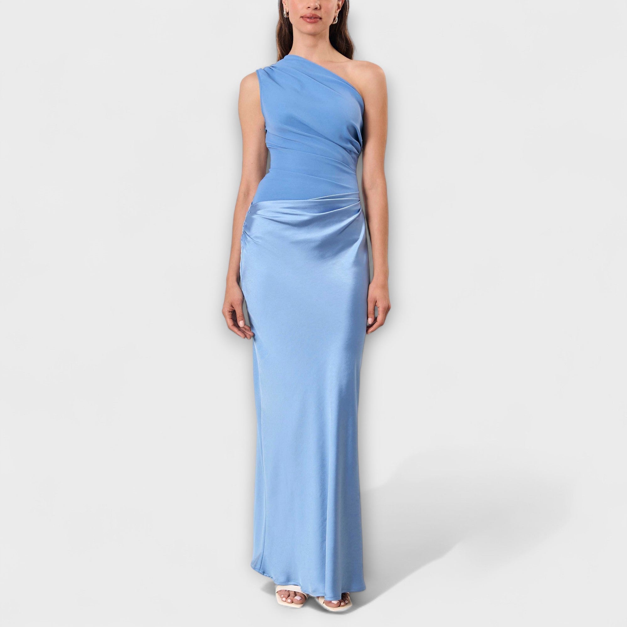 One-shoulder pleated maxi gown in rich dark green with a sweeping full-length skirt